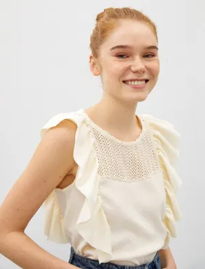 Sleeveless Ruffle Shoulder Blouse in Cream