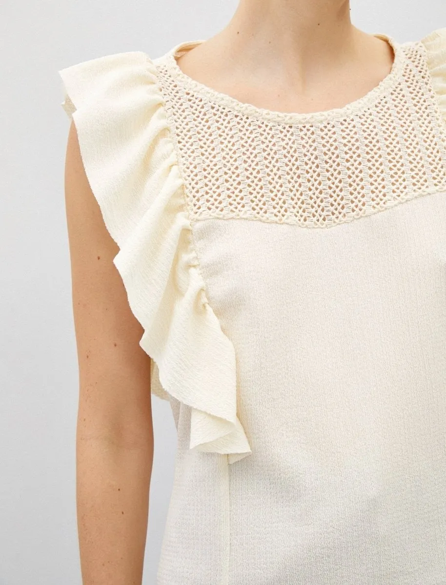 Sleeveless Ruffle Shoulder Blouse in Cream