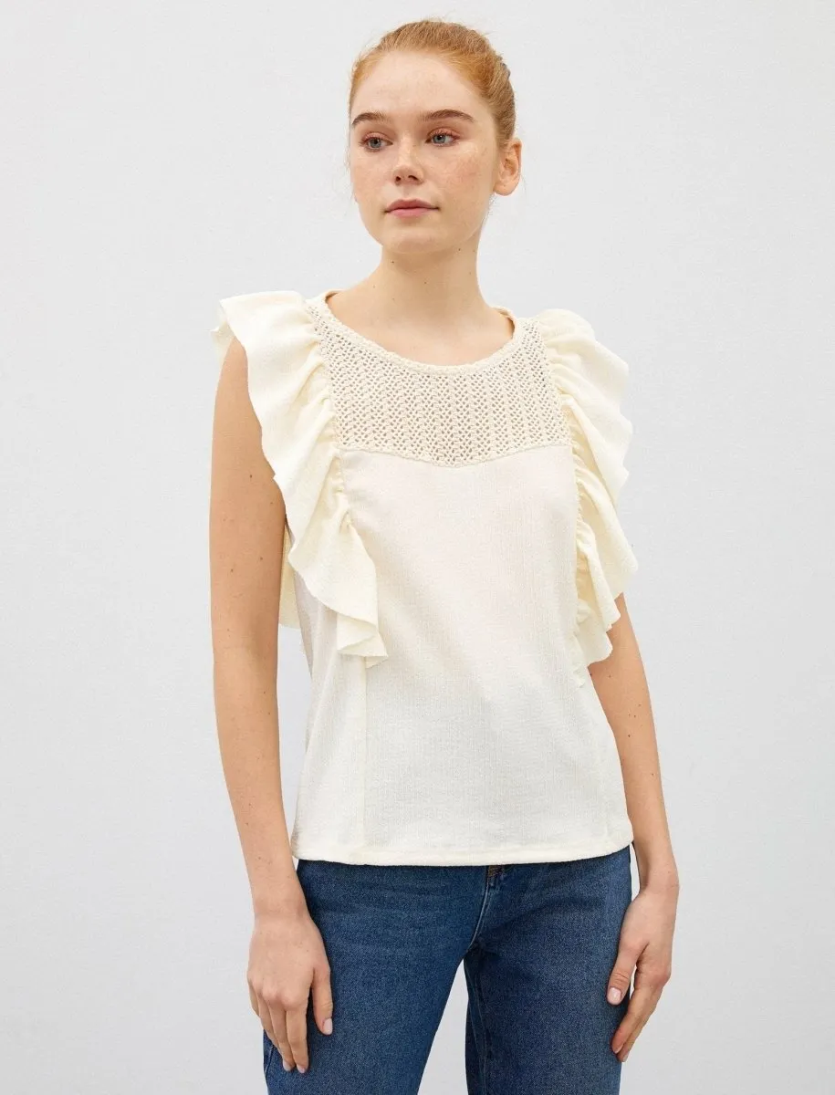 Sleeveless Ruffle Shoulder Blouse in Cream