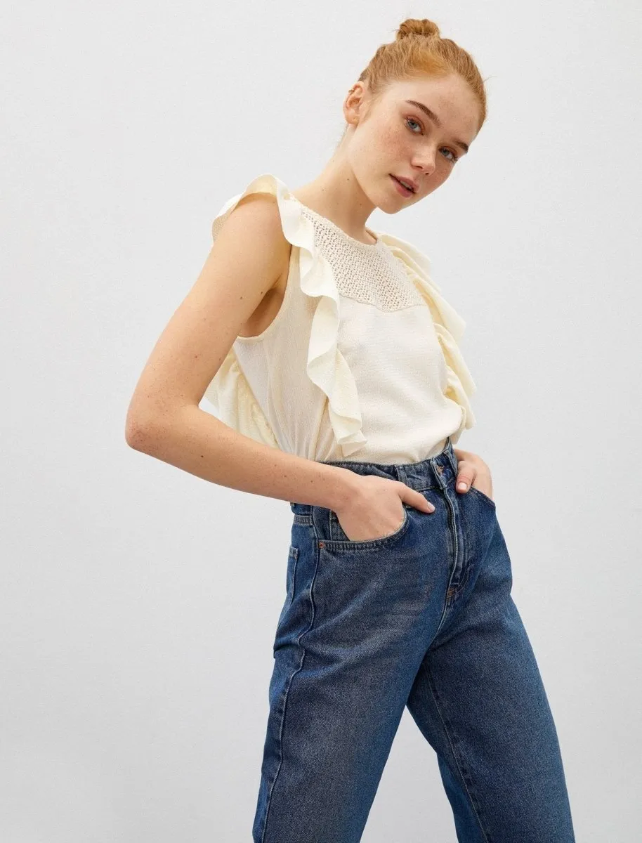Sleeveless Ruffle Shoulder Blouse in Cream